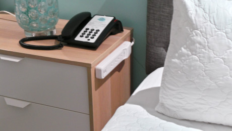 Additional outlet access by nightstand